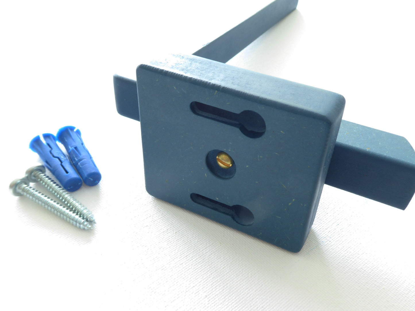 Mounting system for the wall mounted ight bracket showing the screws and wall plugs which are included with the bracket