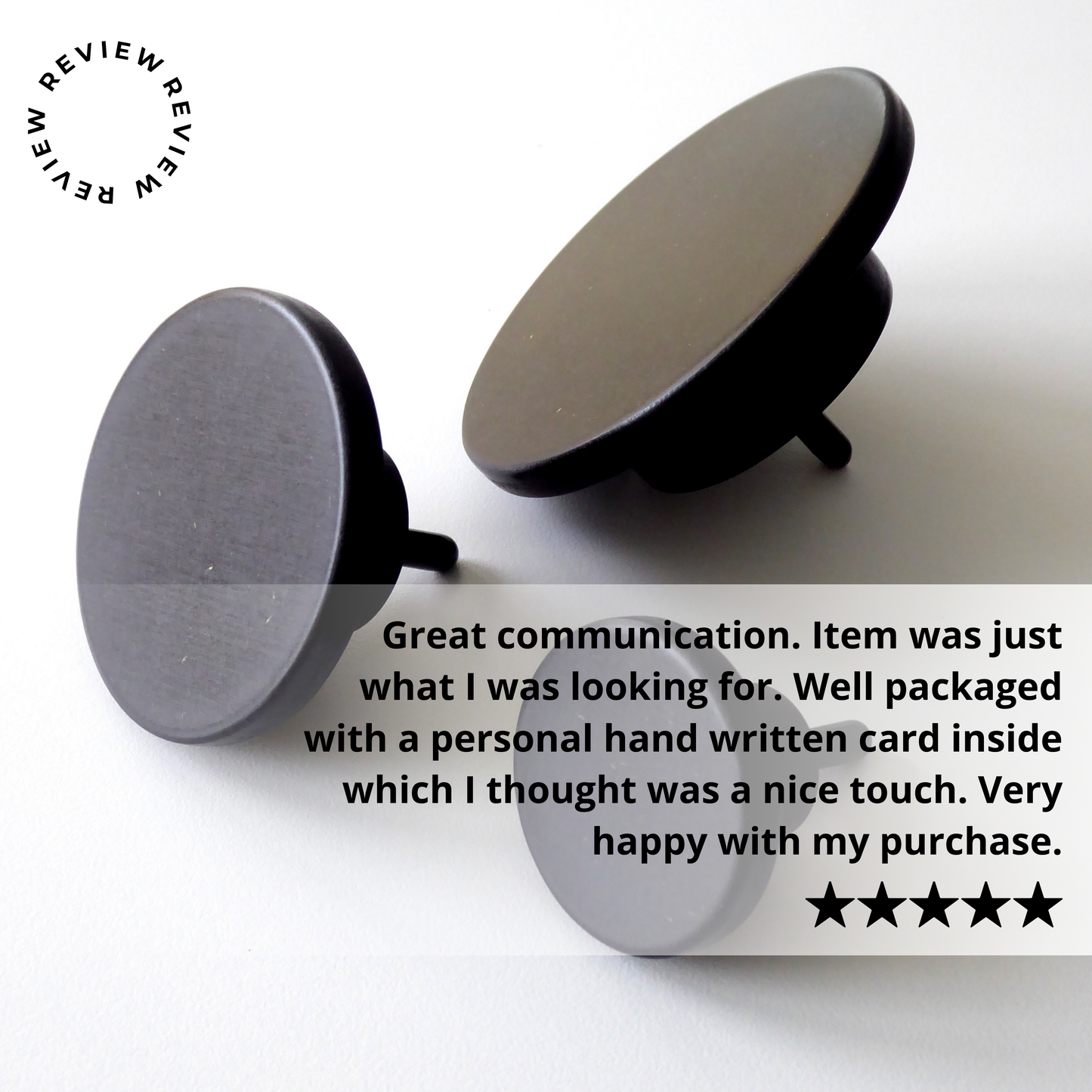 Two black wooden coat hooks on a white background with a five-star review