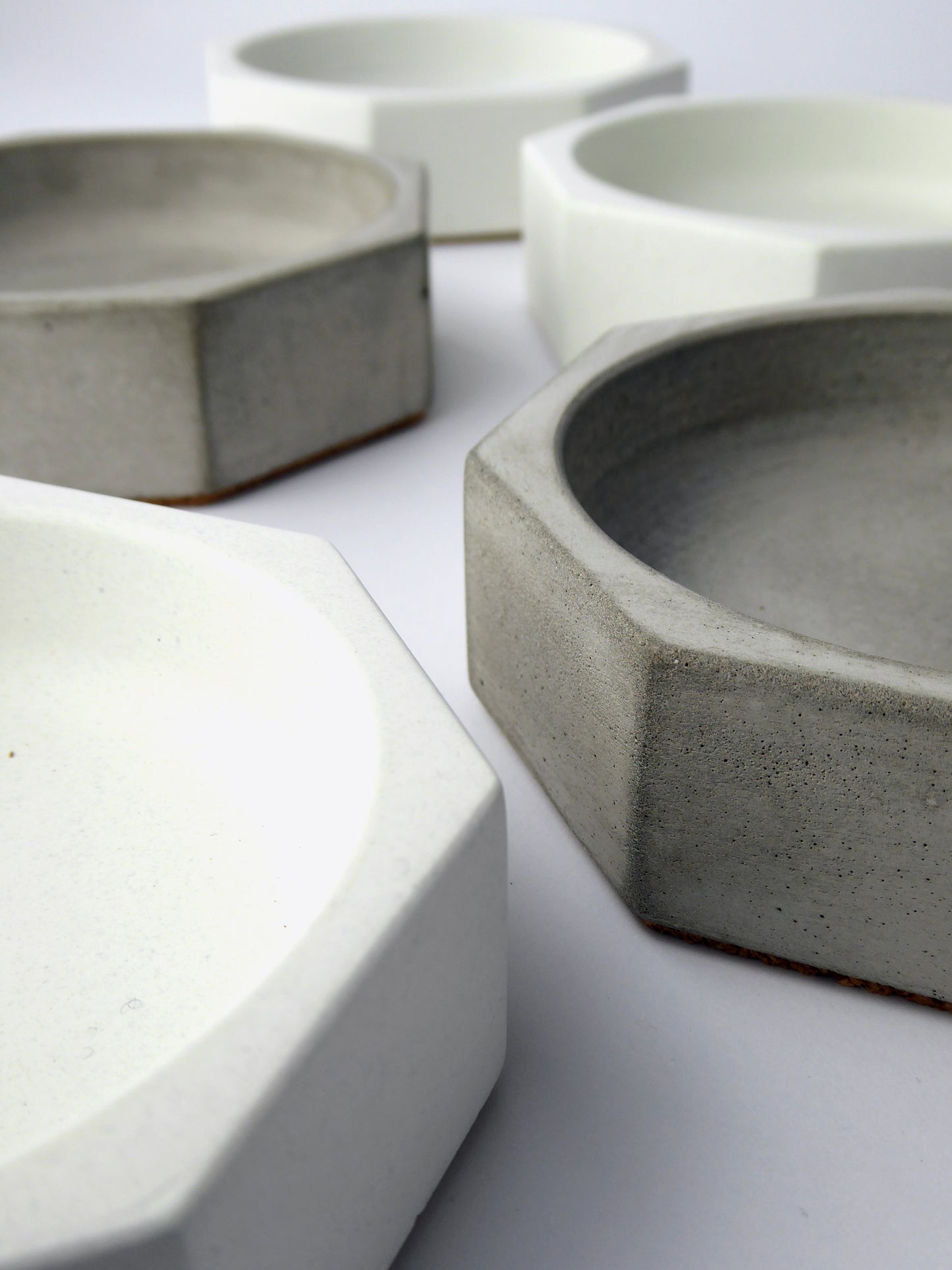 White and grey bowls on a white background