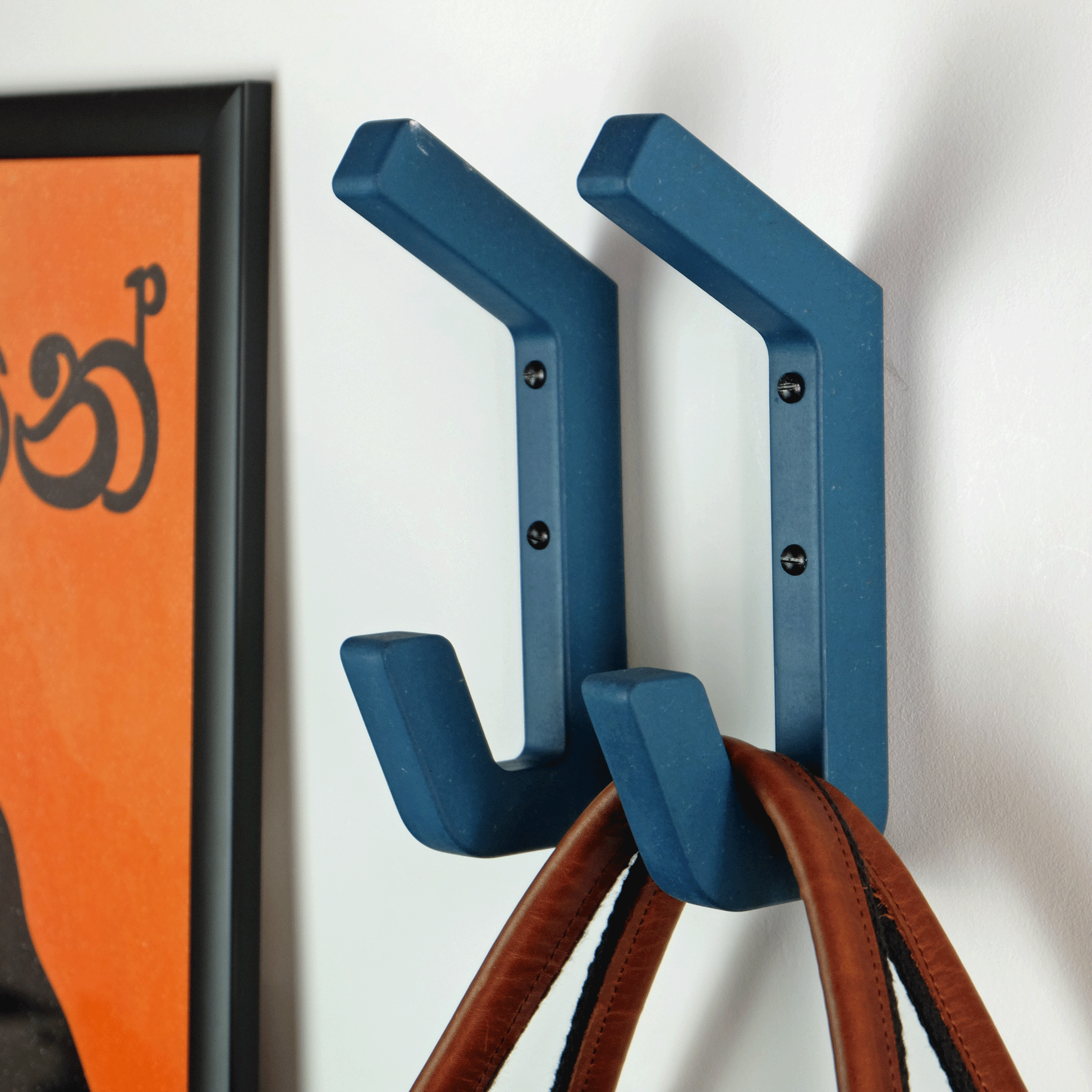 Oversize wall hooks in blue wood