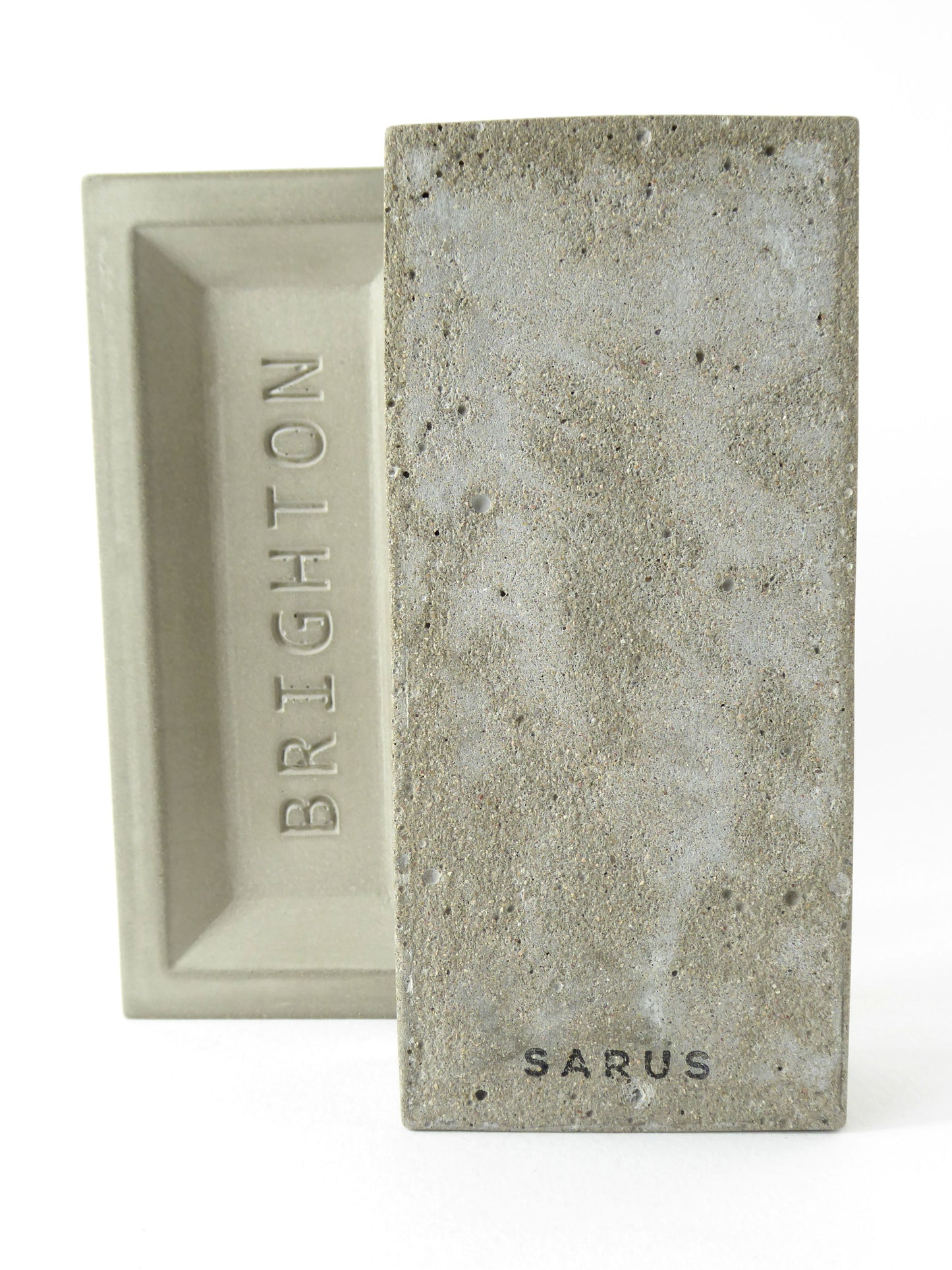 Concrete brick with 'Brighton' engraved on it