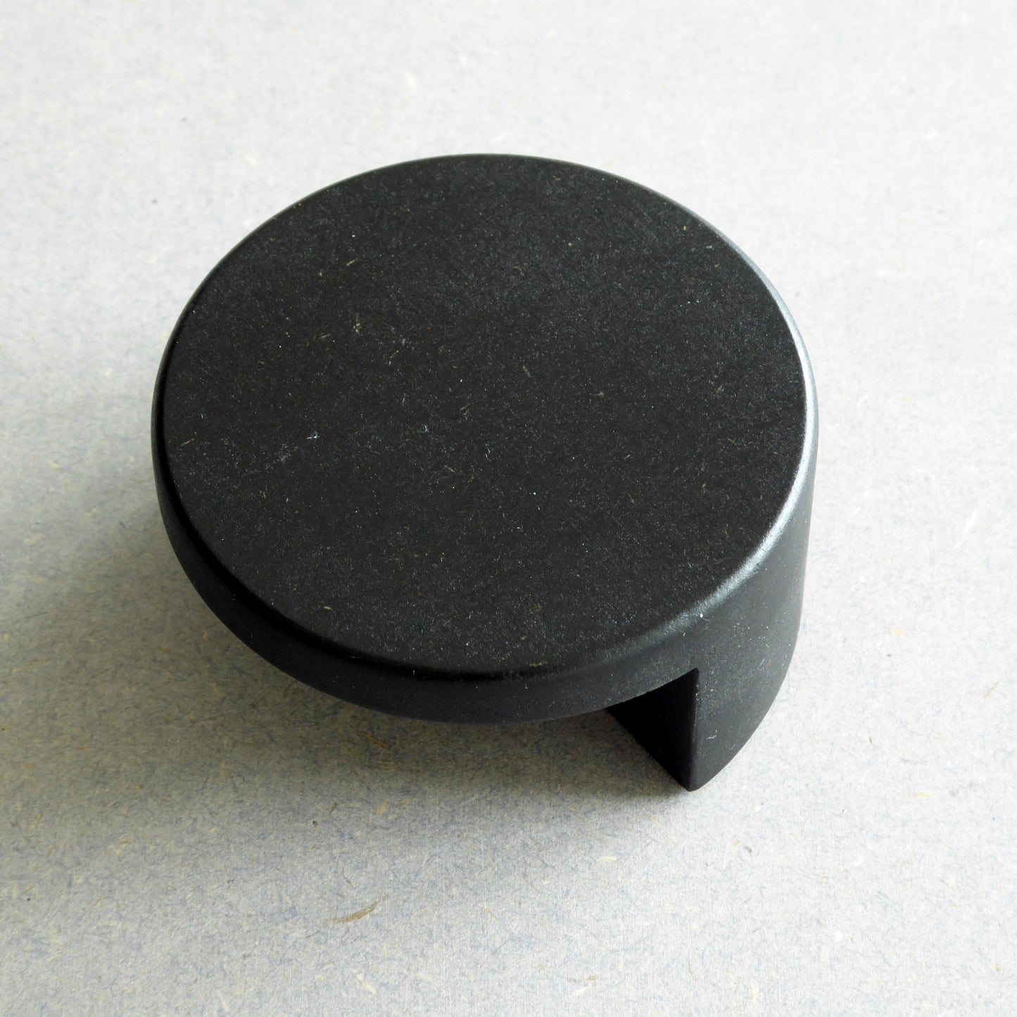 Contemporary black wooden drawer handle