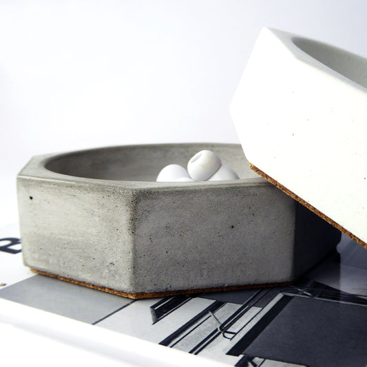 Concrete bowl with ear pods
