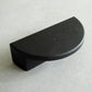 black drawer pull in half moon shape