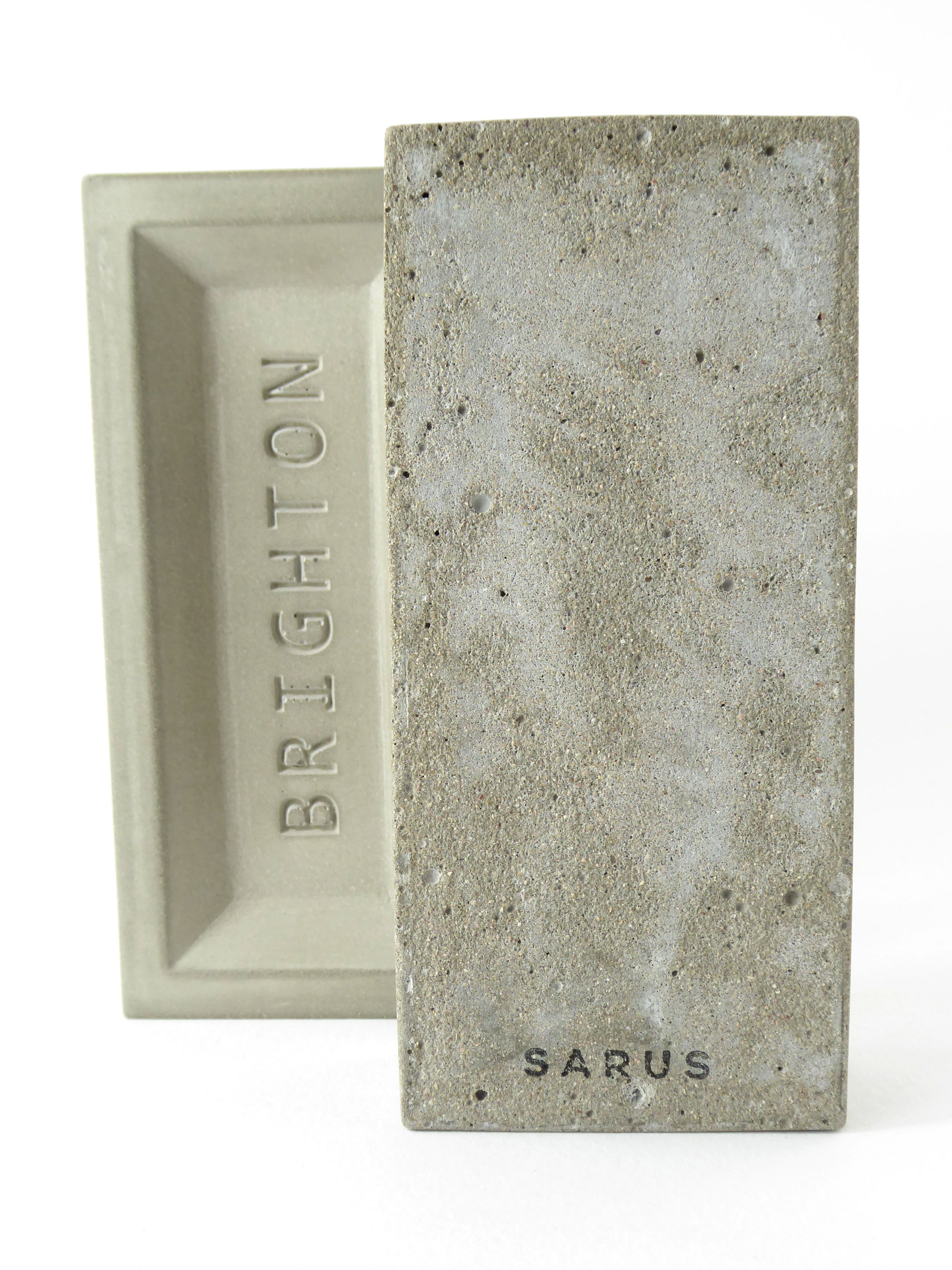 Concrete brick with 'Brighton' engraved on it 