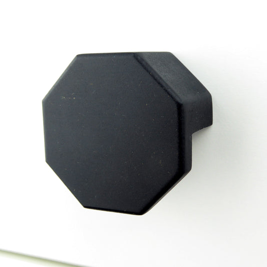 black wooden cabinet knob