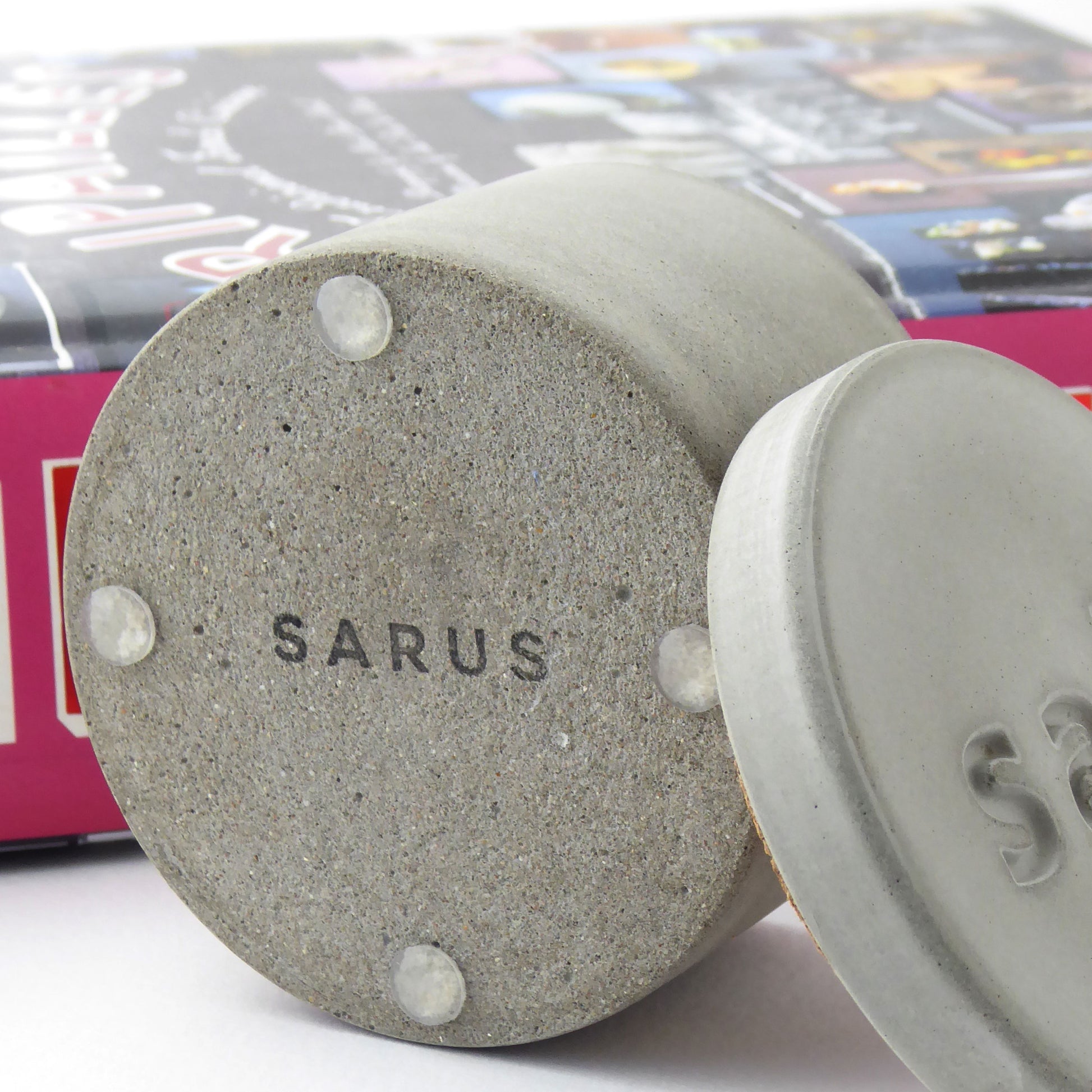 Concrete pot with rubber feet on the bottom to protect surfaces